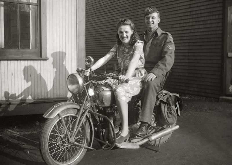 #24 Couple on a Triumph motorcycle, circa 1940s
