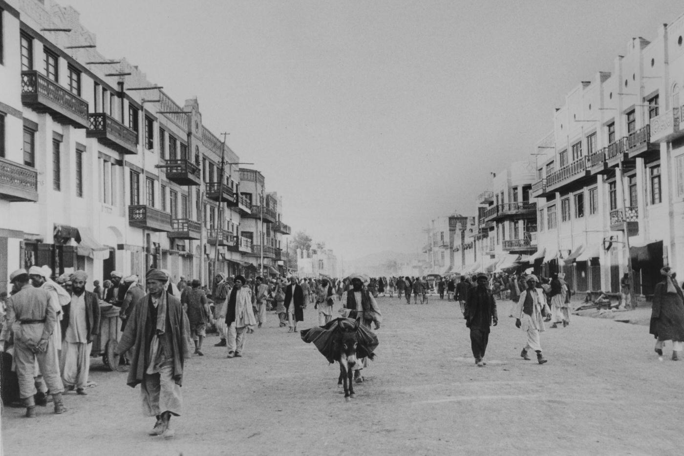 #17 A Kabul street scene without traffic, circa 1950.