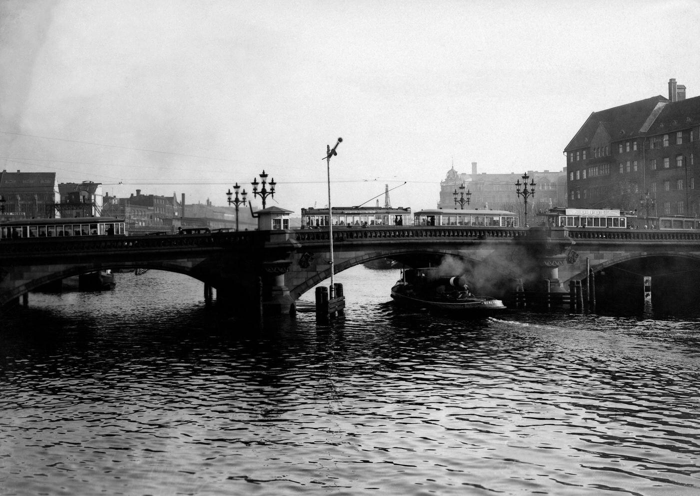 #82 Germany Berlin: Traffic on the Jannowitzbruecke: tram, pedestrians and cars are crossing the Spree, Berlin, 1952
