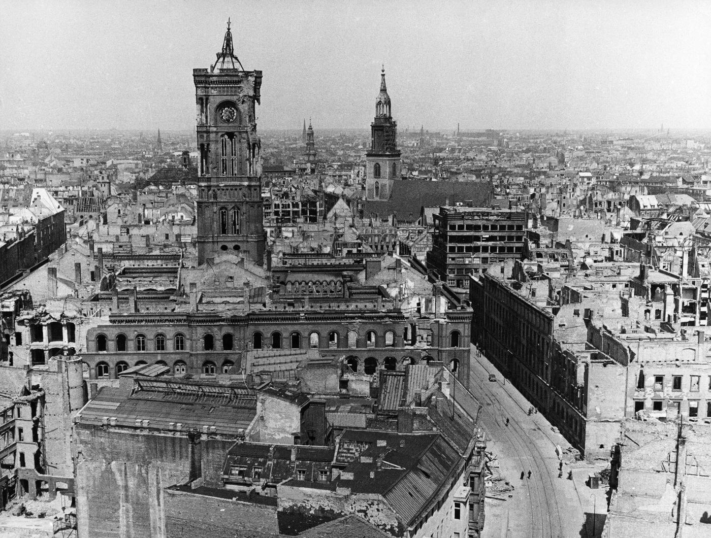 #22 Berlin’s red city hall showing severe bomb damage, Berlin, Germany, 1945.