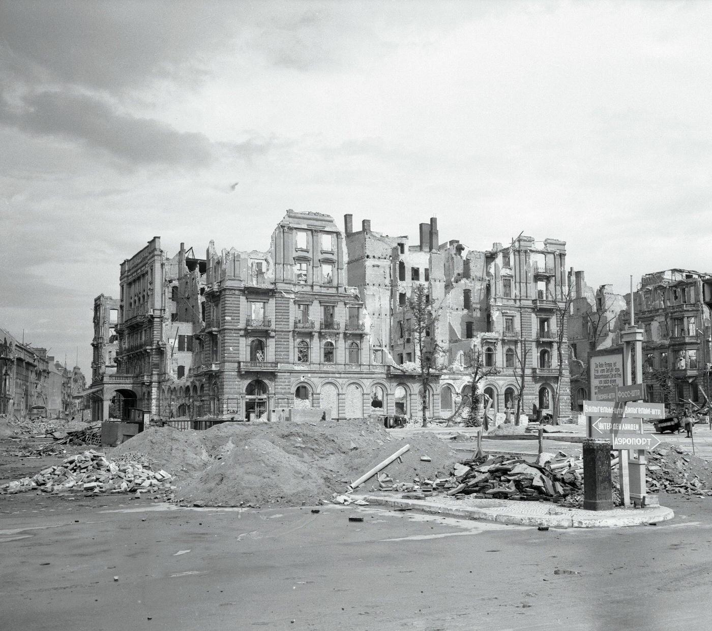 #31 The wreckage of the once-famous Kaiserhof Hotel with Adolph Hitler’s signs in Russian, Berlin.