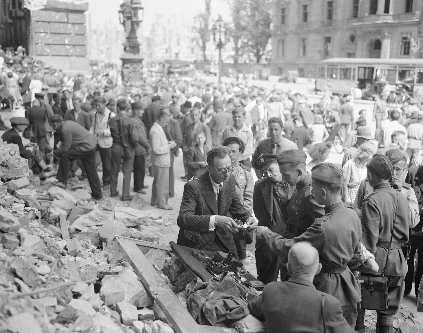 #33 Black market flourishes in Berlin amidst the rubble, German civilians find customers among Allied soldiers.