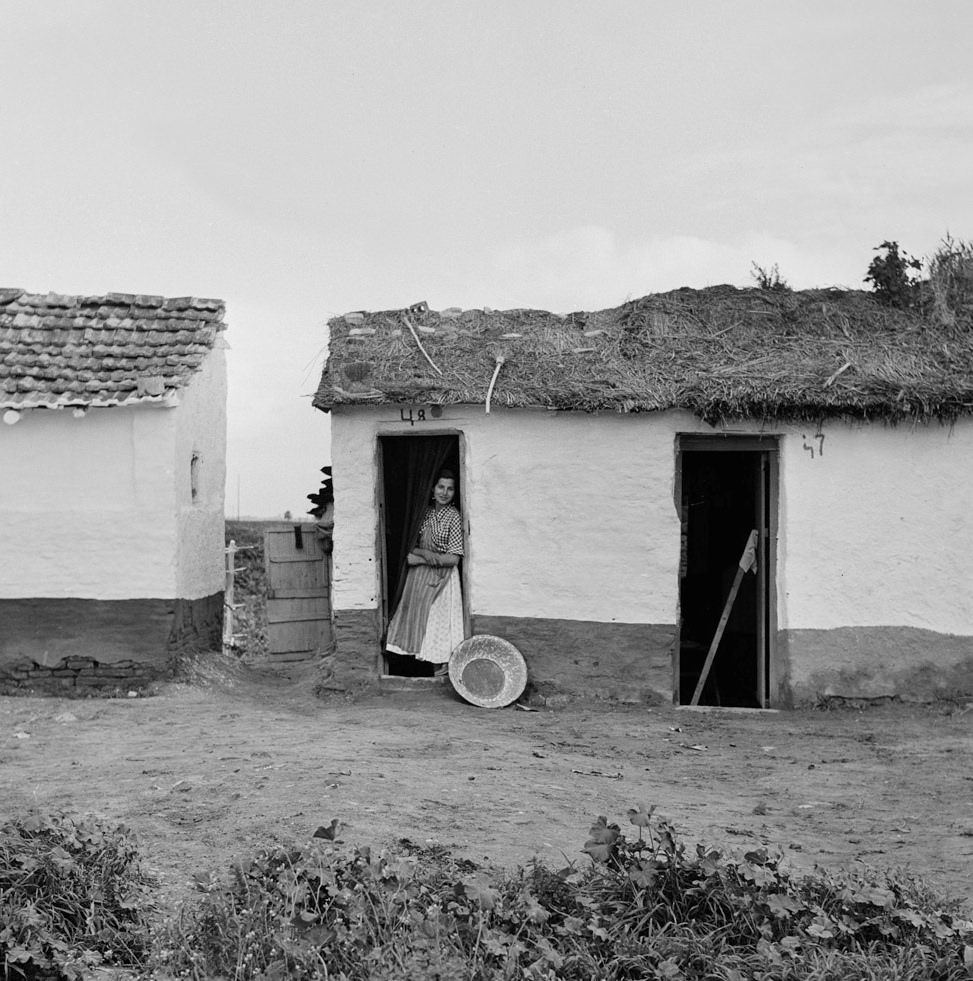 #15 Woman in Doorway, Spain, 1956