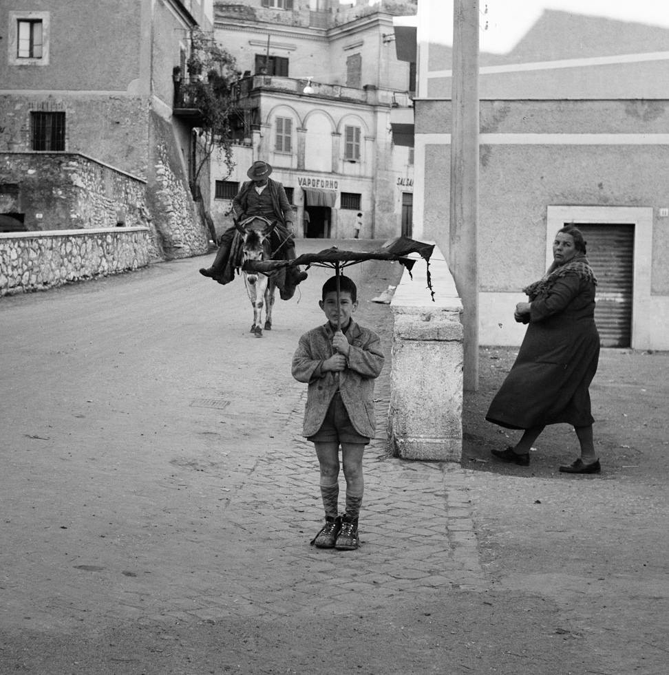 #22 Umbrella Boy, Italy, 1956