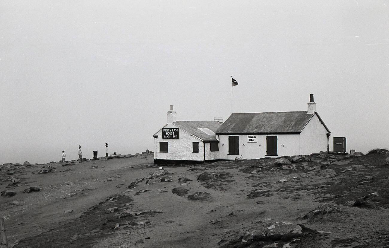 #20 View of the famous ‘First & Last House’ at Land’s End, historic cottage turned tea room selling Cornish souvenirs and snacks, 1970s.