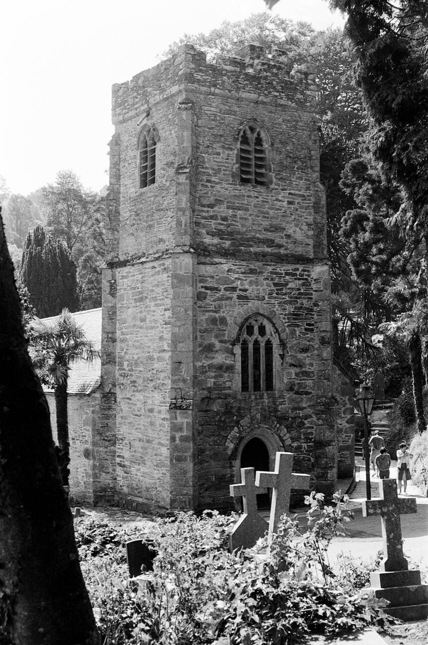 #33 St Just in Roseland Church, a 13th-century church set in riverside gardens with semitropical shrubs and trees, Cornwall.