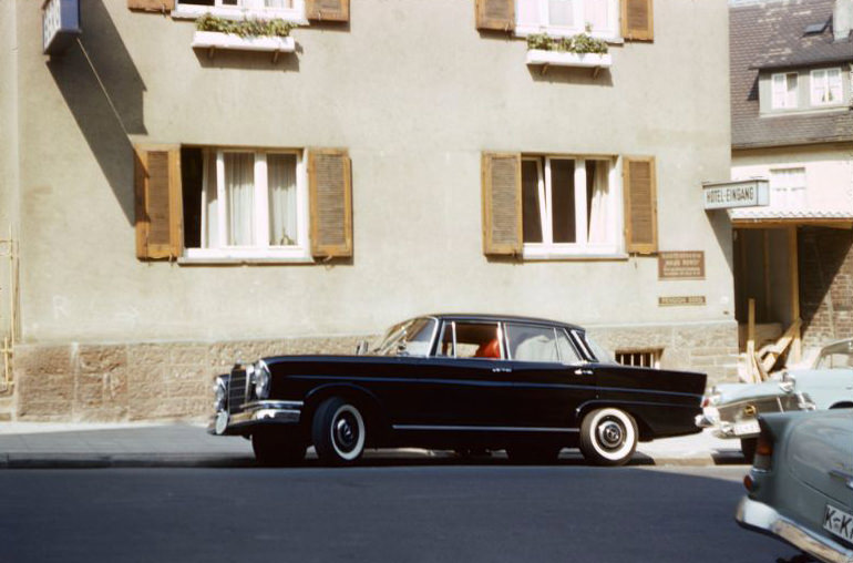 #88 The Mercedes 220 parked in front of Haus Berg, a hotel in Stuttgart, Germany, 1960s