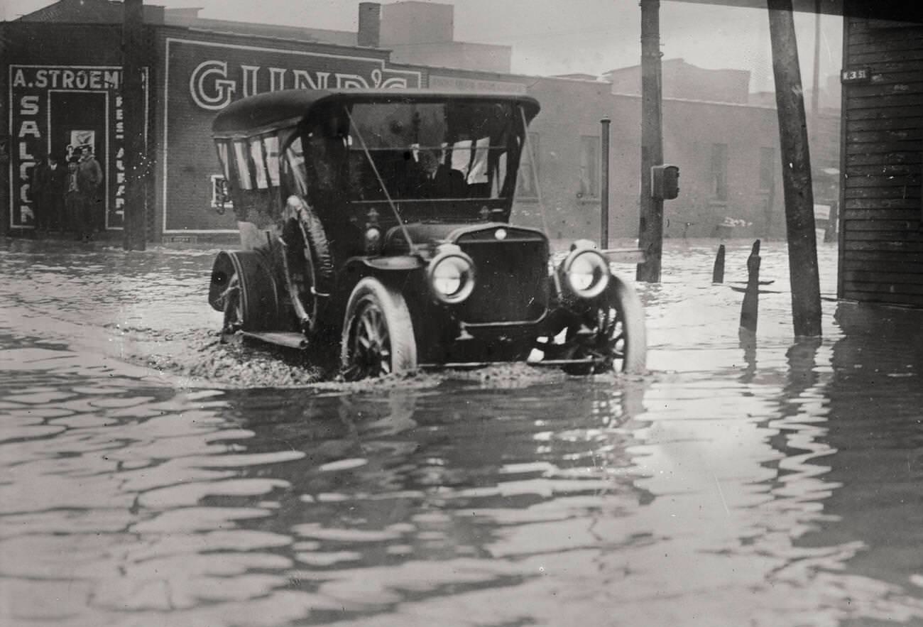 #48 Automobile trying to get through the flood waters during the Great Flood of 1913 in Cleveland, Ohio.