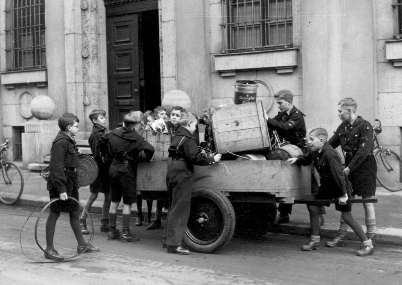 #14 Hitler Youth members collecting scrap metal, 1930s.