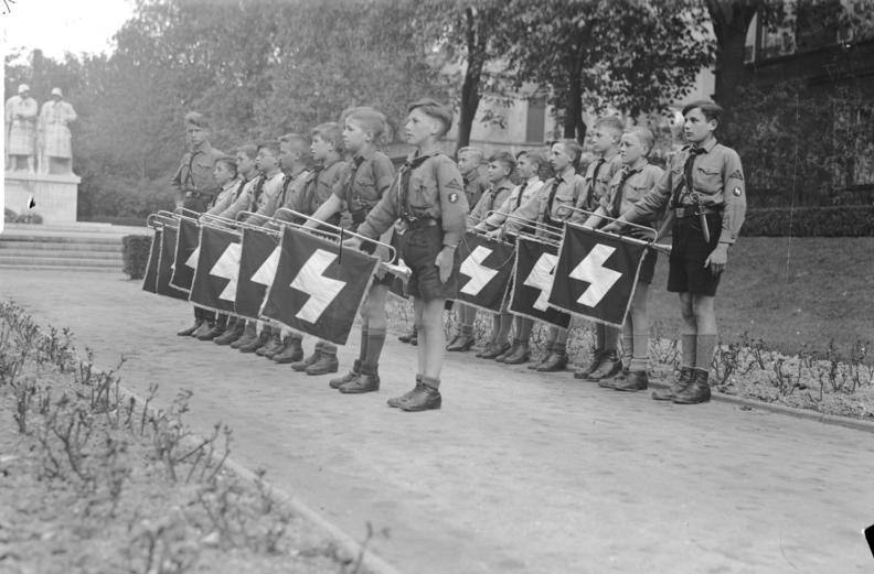 #19 Hitler Youth members standing in formation, Worms, Germany, 1930s.