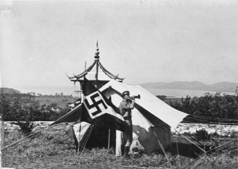 #30 Hitler Youth trumpeter at a camp in Wuxi, Jiangsu, China, 1935.