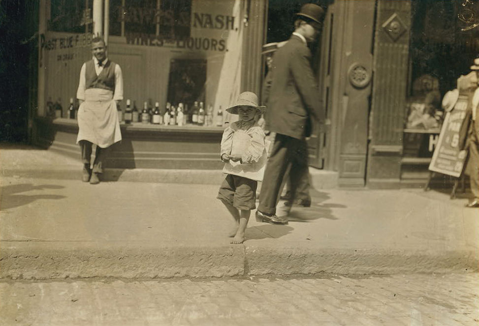 #21 Willie Hutchinson, a six year old newsie in Richmond, 1911.