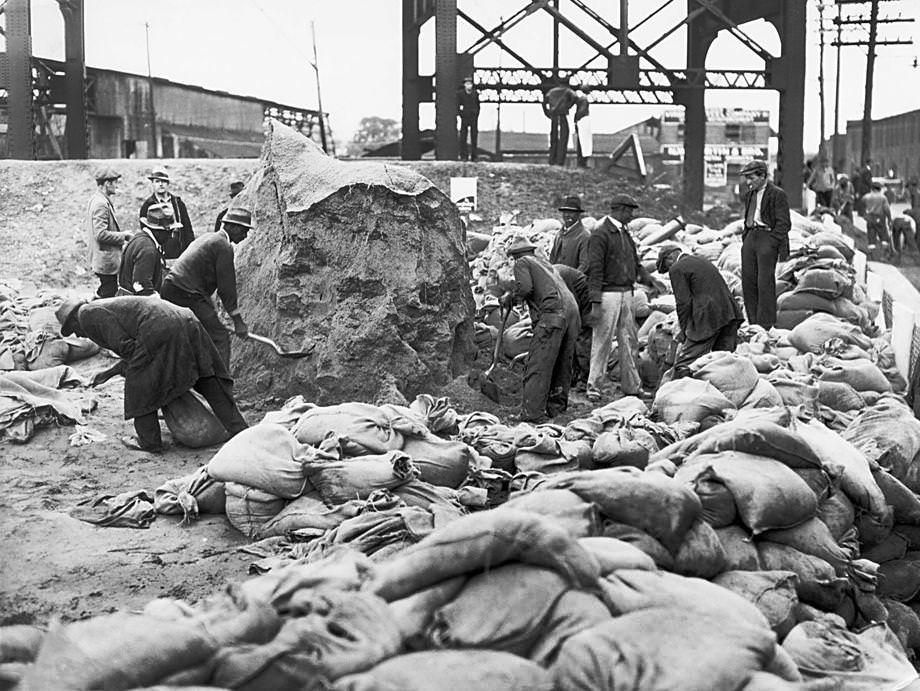 #71 Workers with the Works Progress Administration frantically erected riverfront dikes to protect Richmond from flooding, 1937.