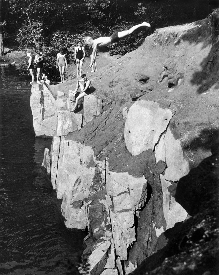 #17 Teenagers enjoyed swimming and diving off rocks at the Bryan Park quarries in Richmond, 1934.