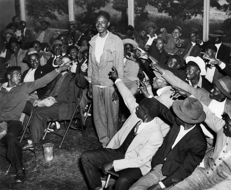 #102 The future of the military draft was in question, and David Burruss, 19, of Norfolk, got lots of attention when he was thought to be the last man selected at the Richmond Armed Forces Induction Station.