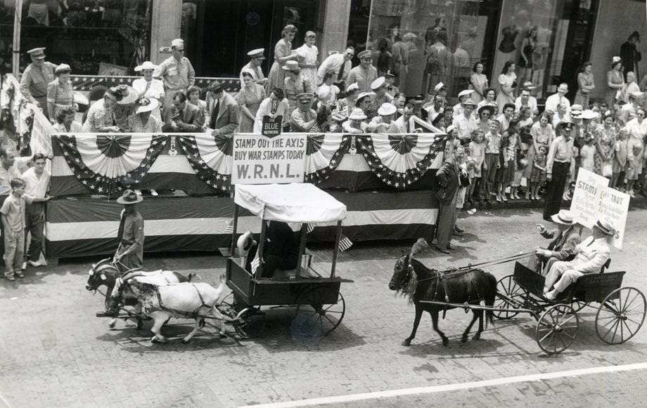 #116 Gas shortages prompted the Retailers for Victory campaign to stage Richmond’s first “gasless parade” to promote the sale of war stamps, which would fund construction of the aircraft carrier Shangri-La, 1943.