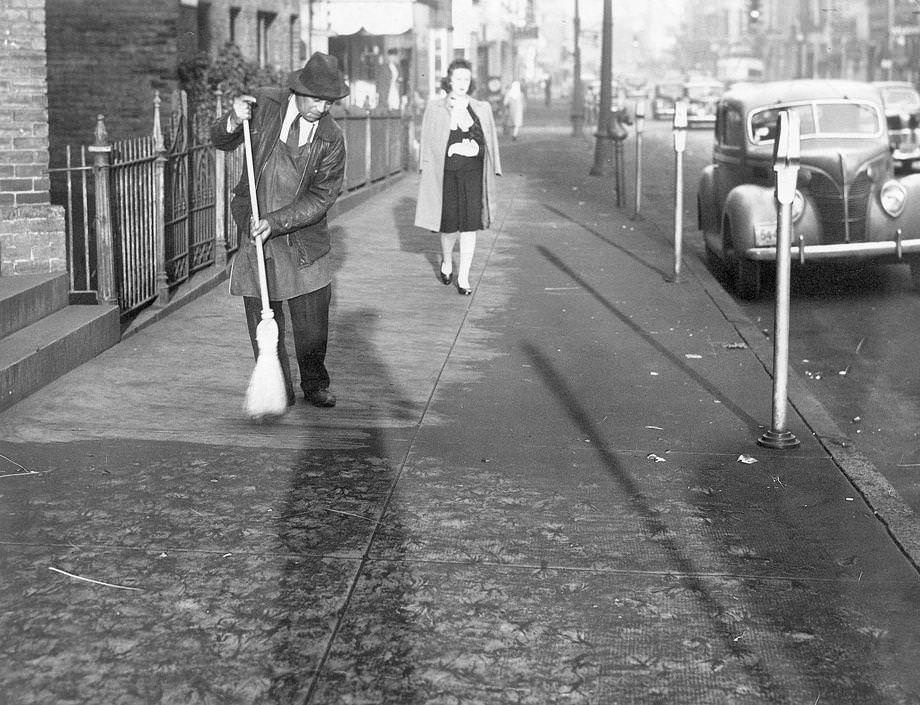 #122 Grace Street sidewalk being cleared of today’s ‘black snow.’ Soot and grime. Air pollution.