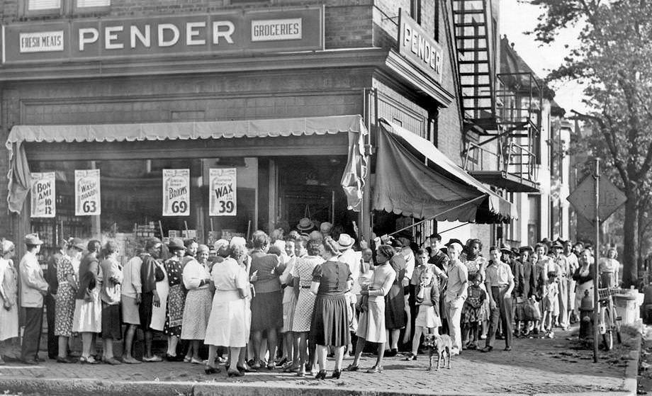 #123 A crowd gathered outside a Richmond grocery store on a day that hard-to-get items were available, 1946.