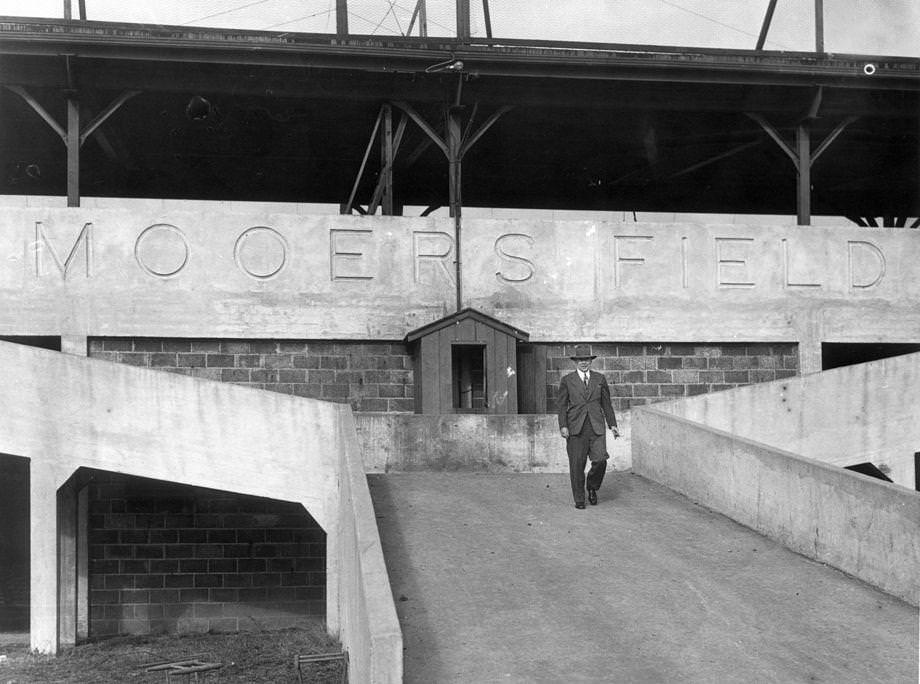 #152 Team owner Eddie Mooers standing outside his baseball park, 1949.