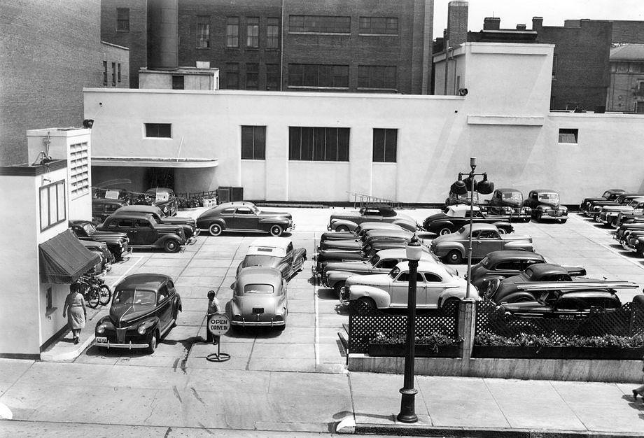 #167 Thalhimers was allowing nighttime use of part of this parking area, at Seventh and East Grace streets downtown, as the Parking Lot Canteen, a place for service members to spend their evenings dancing under the stars, 1943.
