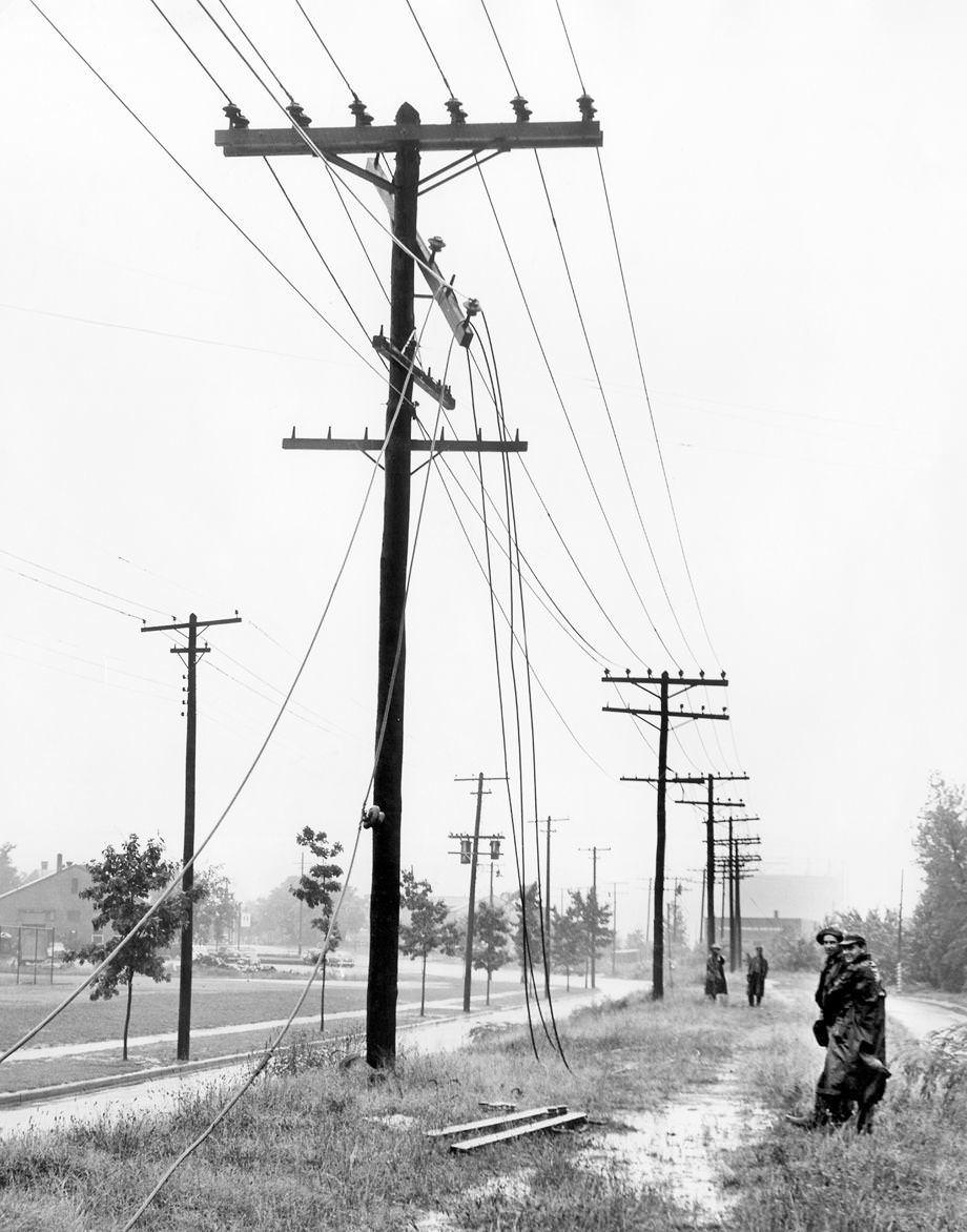#169 A power line on Brook Road was a tangled mess of wires after a lightning strike during a storm, 1949.
