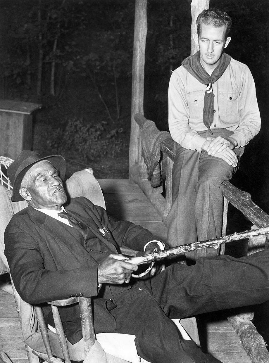 #197 85-year-old B.W. Partee (seated), caretaker at Camp Shawondasee in Chesterfield County for 26 years, was ready to retire, 1947.