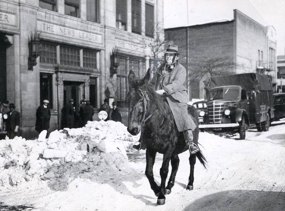 #211 Richmond News Leader reporter Merritt K. Ruddock rides Belle the mule from Bon Air to downtown Richmond on Jan. 25, 1940, after 21.6-inch snowfall paralyzed the region.