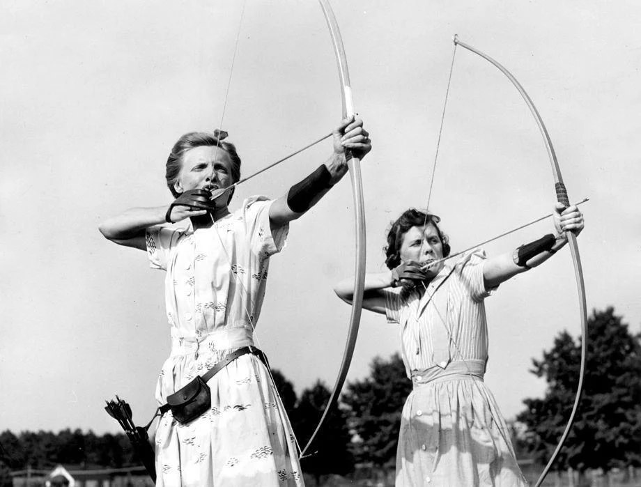 #65 Elwyn Major (left) and Virgie Gentry of Richmond practiced archery, a sport that was attracting more interest from females, 1941