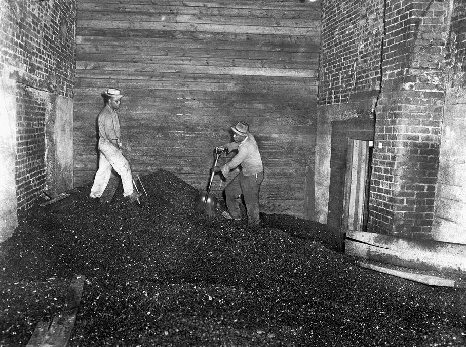 #96 This coal bin in the Highland Springs High School shop building was cleaned out and converted into a practice room for the school band, 1950.