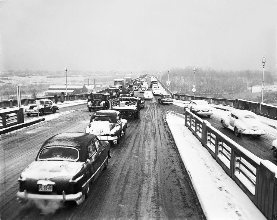 #110 A surprise 5-inch snowfall covered Richmond and kept traffic on the slushy Lee Bridge moving slowly, 1950.