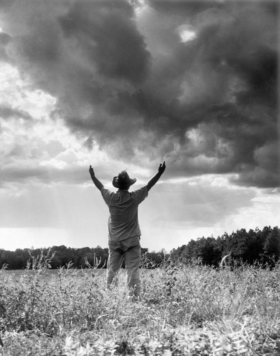 #186 A Chesterfield County farmer welcomed the sight of rain clouds, though they didn’t yield any rain, 1958.