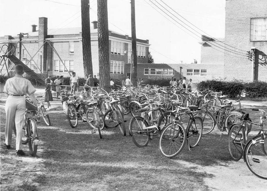 #193 A yard full of bicycles made clear that classes were back in session at Westhampton School in Richmond, 1958.