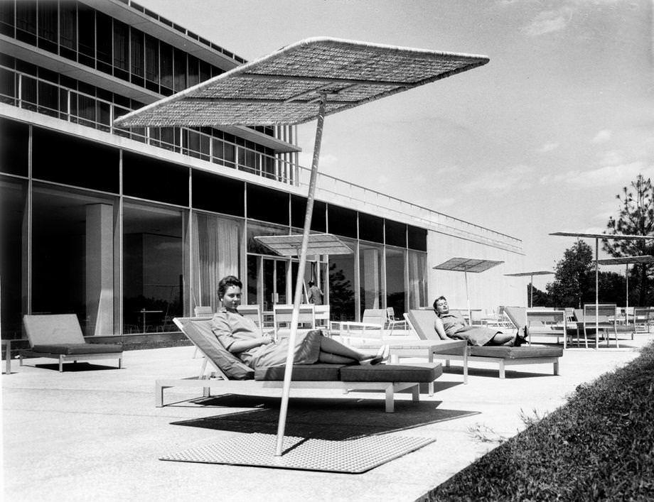 #197 Reynolds Metals Co. employees Ethel Blue (left) and Bonnie Foy enjoyed some sun at the company’s new office space in Henrico County, 1958.