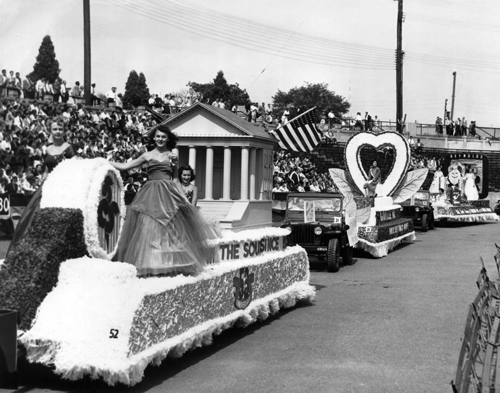 #214 Floats in the National Tobacco Festival parade completed their promenade around City Stadium before the football game between the University of Richmond and Hampden-Sydney College, 1954.