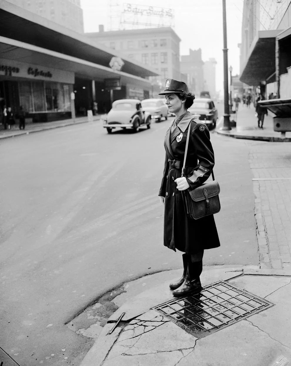 #233 Mrs. M.S. Jackson, one of Richmond’s first full-fledged female traffic officials with full police authority, worked at Seventh and Grace streets downtown, 1952.