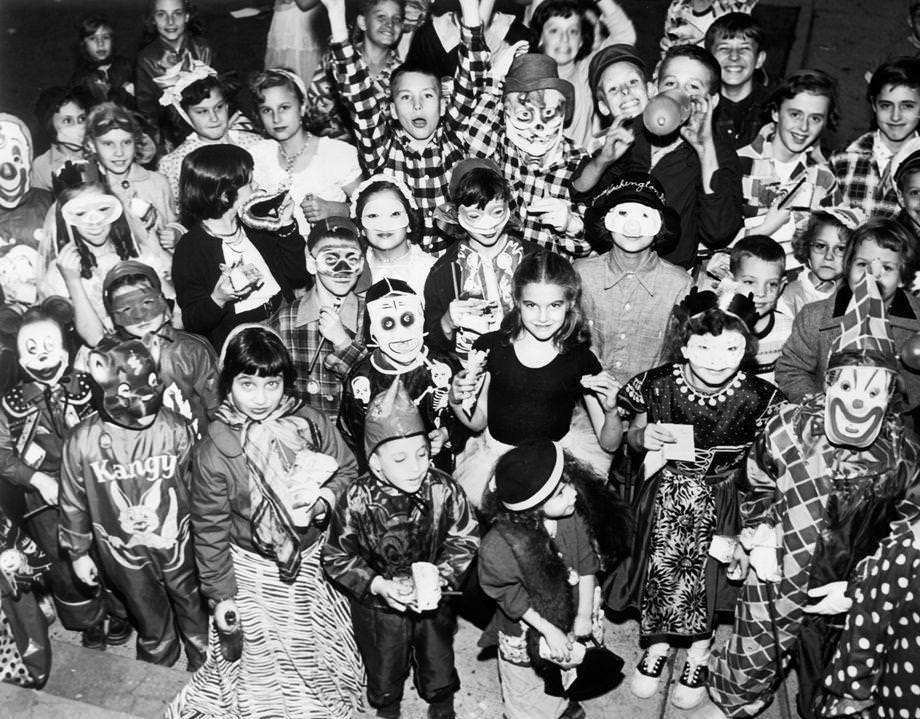 #44 A group of costumed children celebrated Halloween at the William Fox playground in Richmond, 1954.