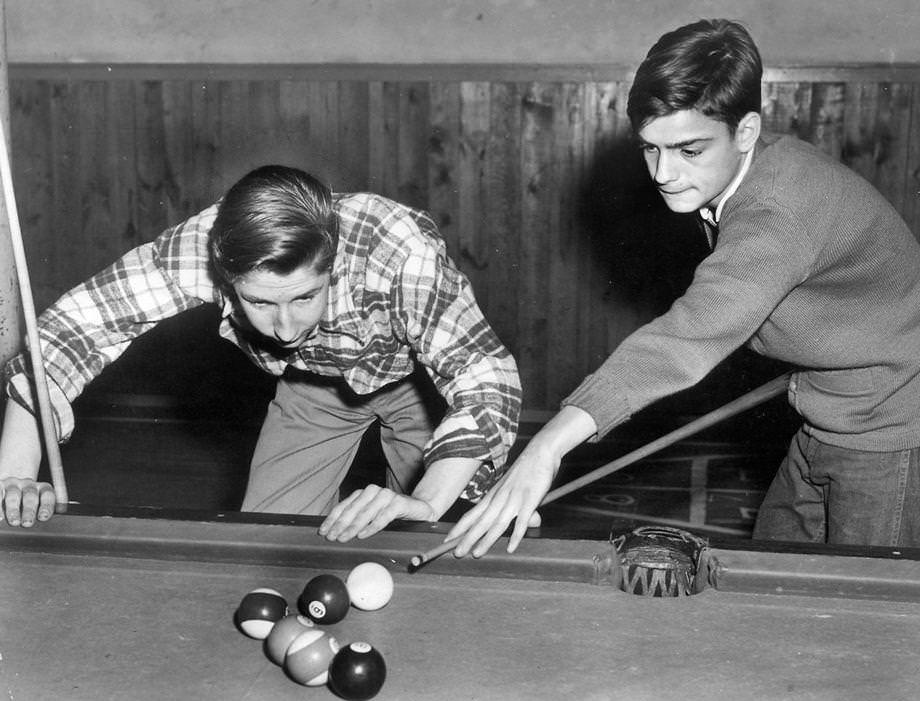#54 Bobby Seal (left), 15, and Marvin “Kayo” Williams, 14, played billiards on the new table at the Salvation Army’s Red Shield Boys Club, which was on Church Hill in Richmond, 1950.