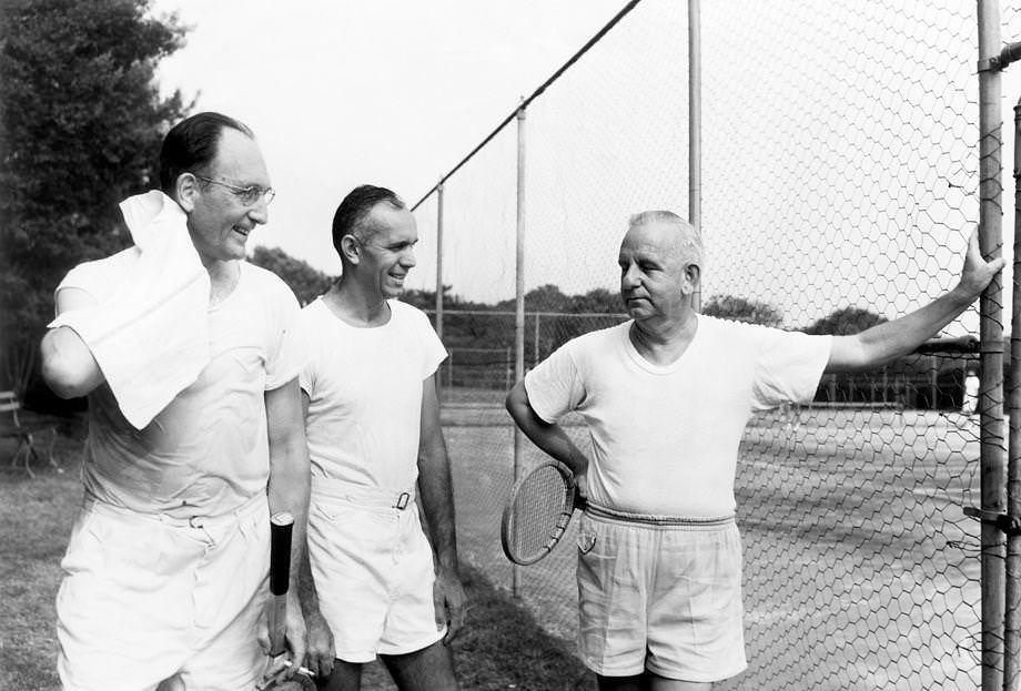 #59 Tennis players (from left) Cliff Miller, Al Dickinson and Bob Figg Sr. discussed the Country Club of Virginia’s annual tennis competition, which began the day before, 1953.
