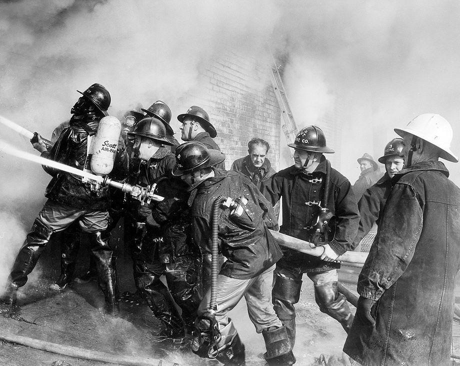 #65 Firefighters battled at blaze at L.R. Brown & Co., a furniture store on Hull Street in South Richmond, 1952.