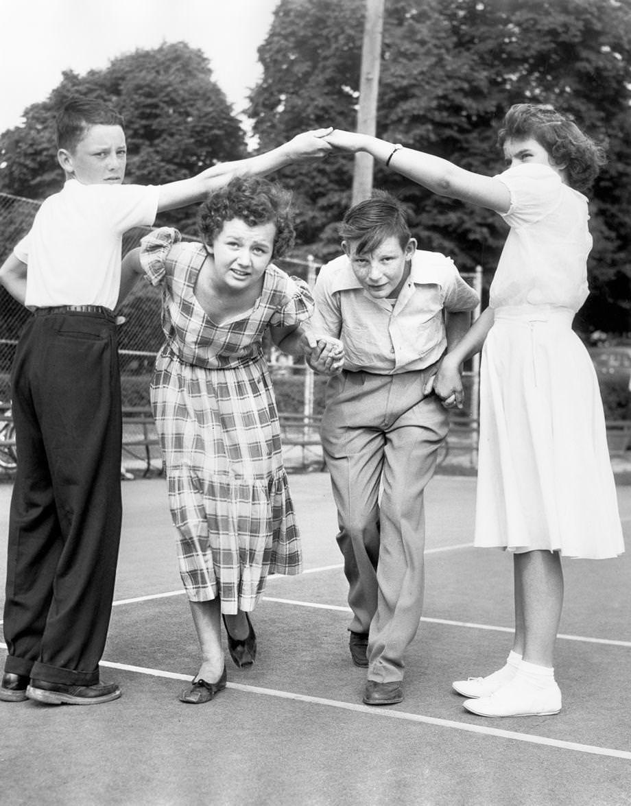 #71 Clifford Burgess (from left), Harlean Bibb, Charles King and Shirley Kingsley, who attended Summer Hill School in South Richmond, practiced a square dance called “Duck for the Oyster”, 1950