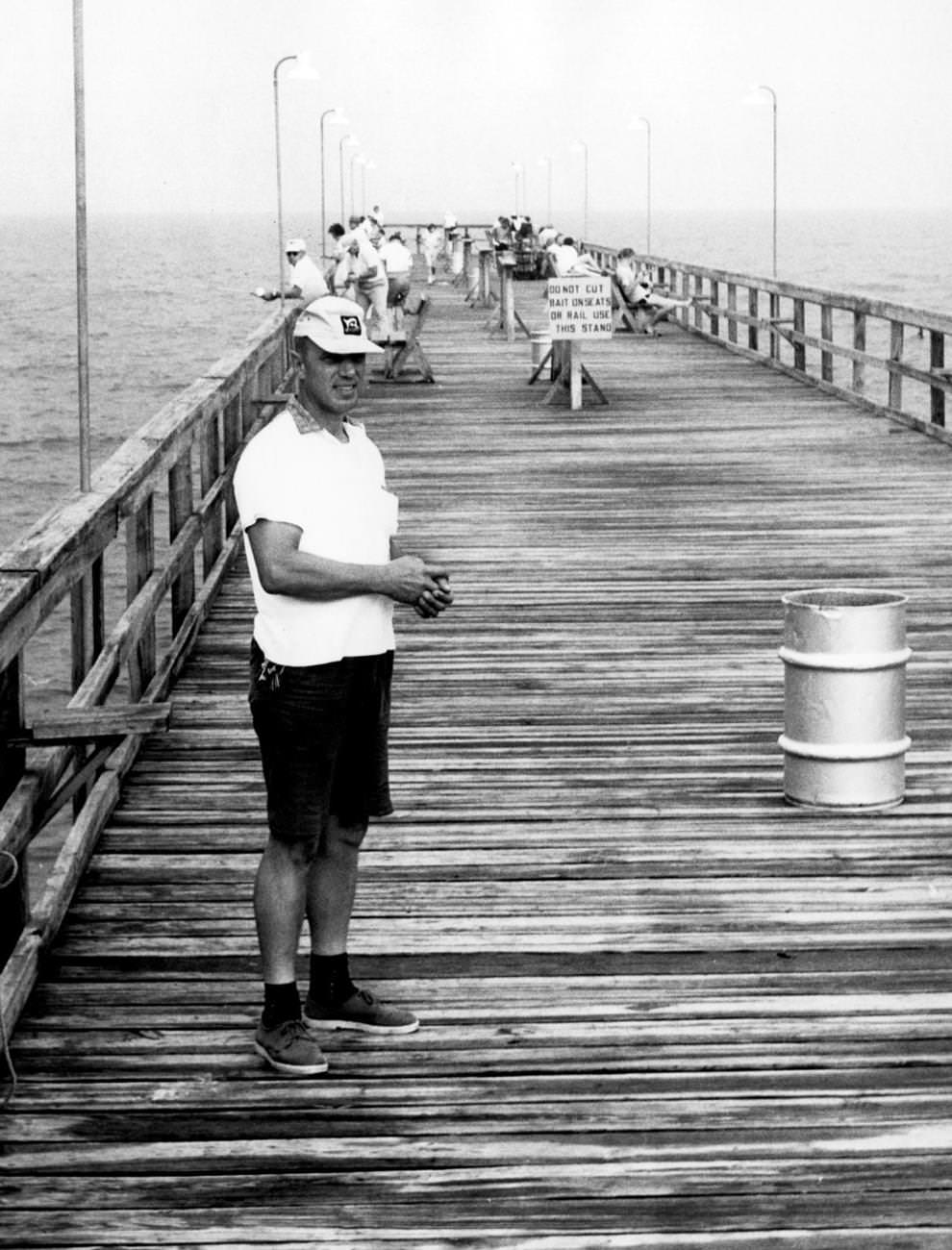 #91 George C. “Skid” Abbott, who had converted the old Gordon’s fish packing house at Buckroe Beach in Hampton into a popular sport-fishing pier that attracted anglers for day and night fishing, 1961.