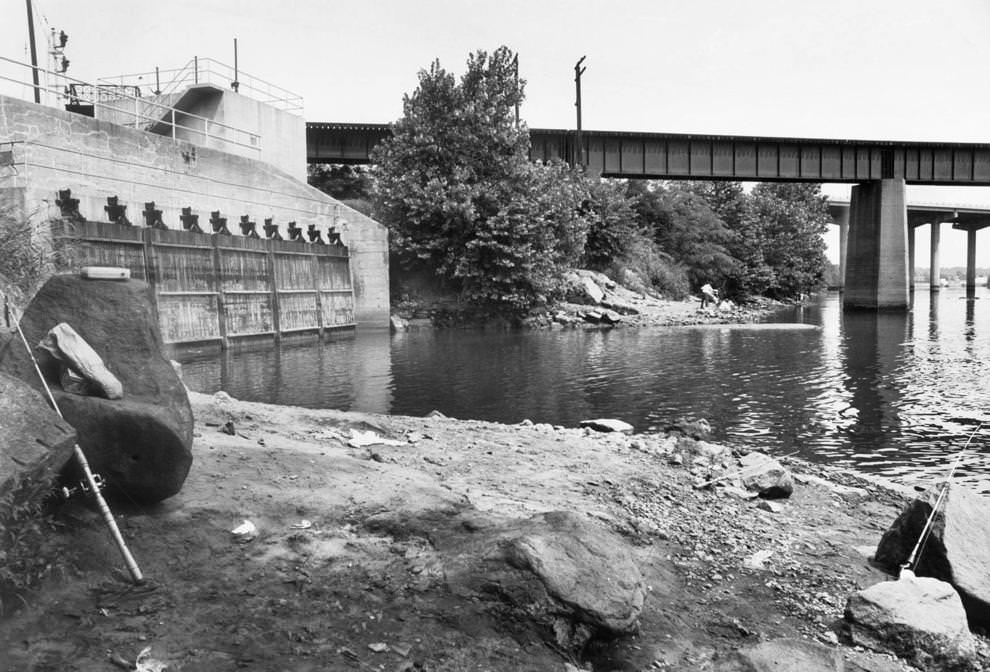 #99 The Shockoe interceptor gates along the James River opened after torrential rains in Richmond, 1965.