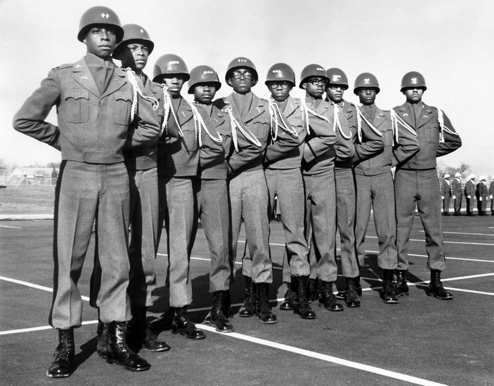 #34 New cadet corps officers at John F. Kennedy High School posed outside their school, 1969.
