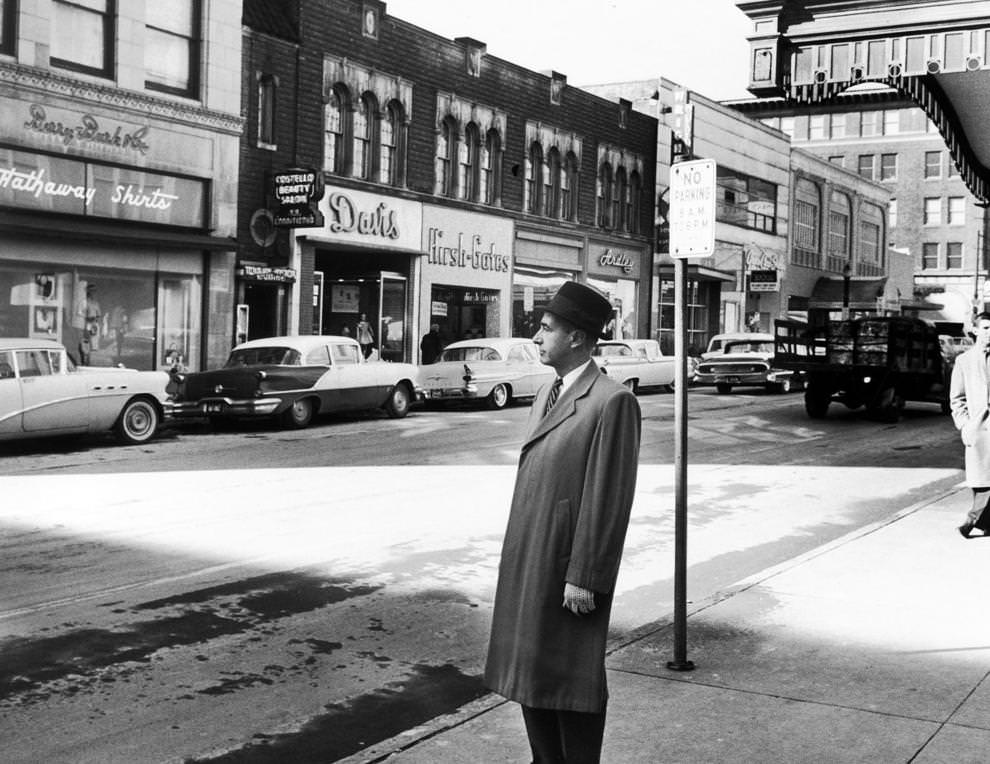 #1 Raymond Munsch, vice president of Miller & Rhoads, surveyed the Grace Street retail district, 1961.