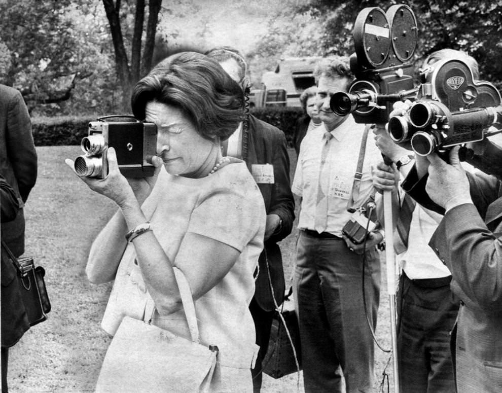 #38 Lady Bird Johnson played tourist with a movie camera during a trip to Monticello near Charlottesville, 1965.