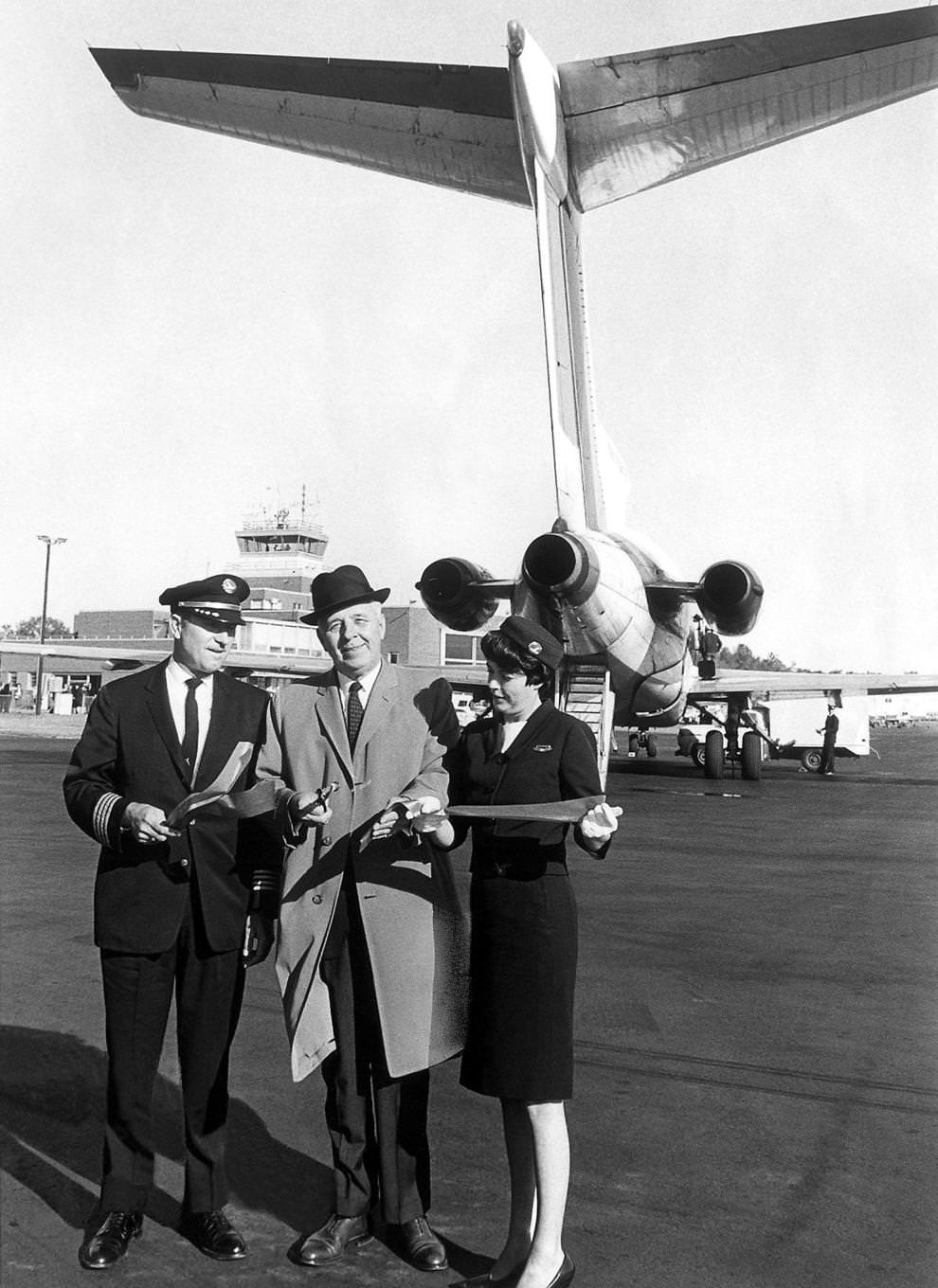 #43 Richmond Mayor Morrill M. Crowe cut a ceremonial ribbon to mark the inauguration of the Eastern Airlines passenger service from Byrd Field to New York, 1965.