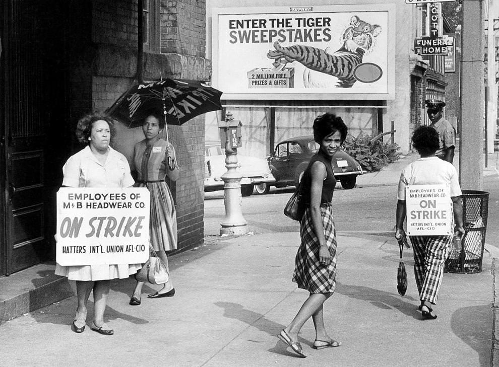 #54 Employees of M&B Headwear Co. Inc. picketed outside the Richmond factory, one of the country’s largest suppliers of military caps, 1965.