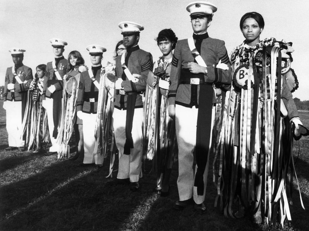 #58 Cadets at John Marshall High School in Richmond posed with their ribbon-bedecked sponsors after an awards ceremony, 1969.