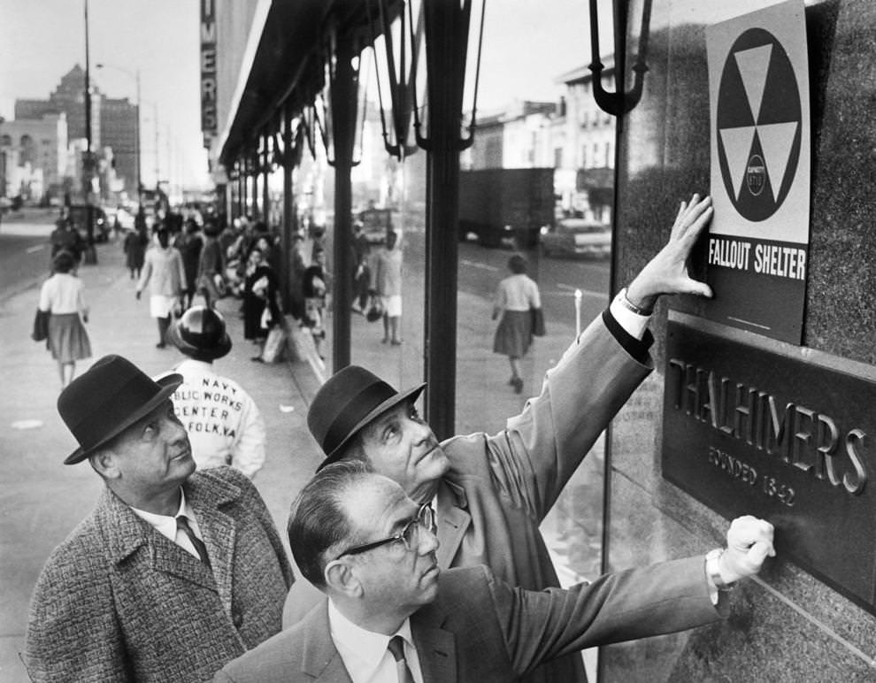 #61 A new sign designated the Thalhimers department store in downtown Richmond as a fallout shelter, 1962.