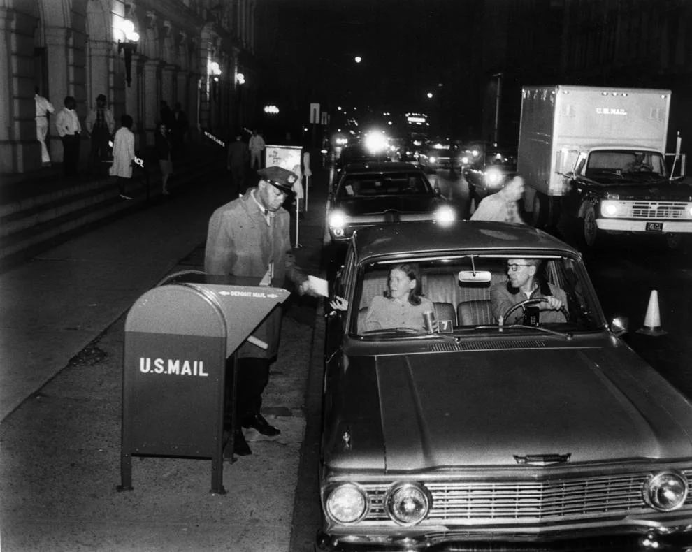 #72 A couple delivered their tax return to the post office at 10th and Main streets in downtown Richmond, 1968.